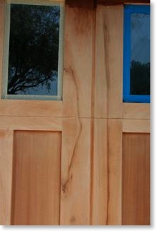 Craftsman garage door is sanded and ready for stain.