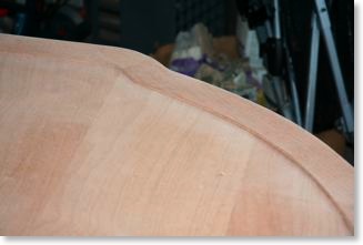 Craftsman mahogany and ebony table edge is raised 1/16