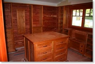 Master closet lined in cedar with cherry cabinets